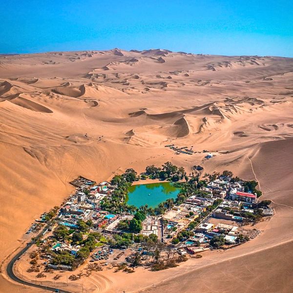 Amazing aerial view of the Huacachina Lagoon.