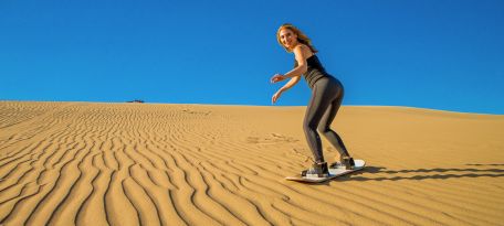 Sandboarding at Huacachina Desert.