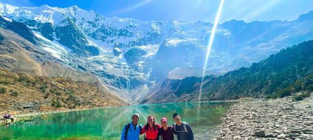 Trekkers visiting the Humantay Lake.