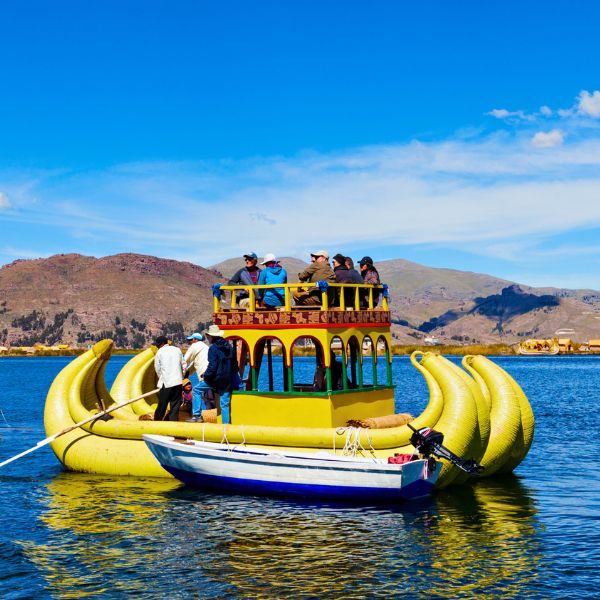 Touring aboard a Caballito de Totora Reed Boat at the Uros Zone.
