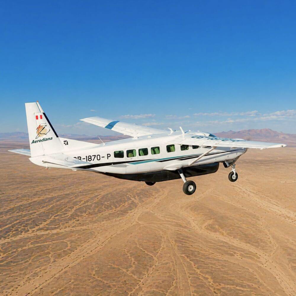 Aircraft flying over the Nazca Desert during scenic flight from Pisco