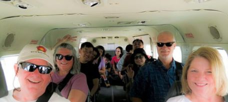 Tourist aboard a Caravan plane ready to fly over the Nazca Desert.