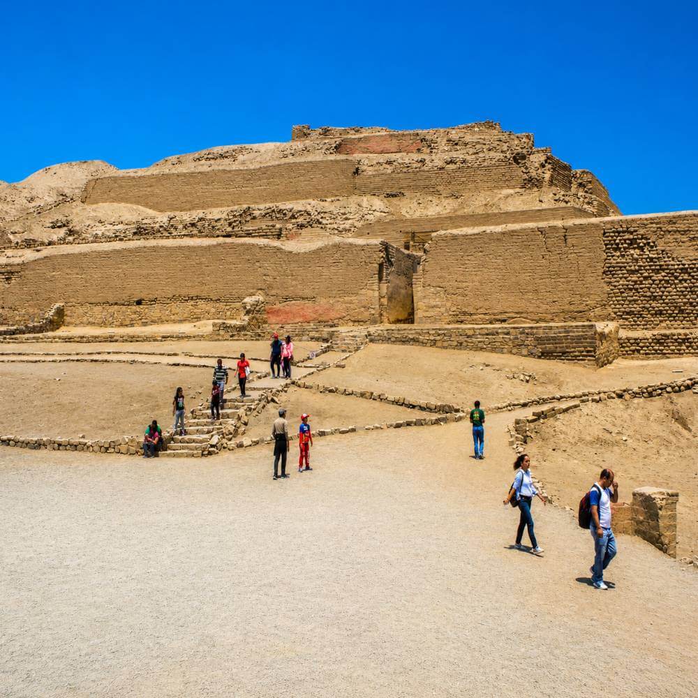 Visitors exploring the Temple of the Sun at the Pachacamac Ruins, one of Peru’s most important pre-Columbian archaeological sites.