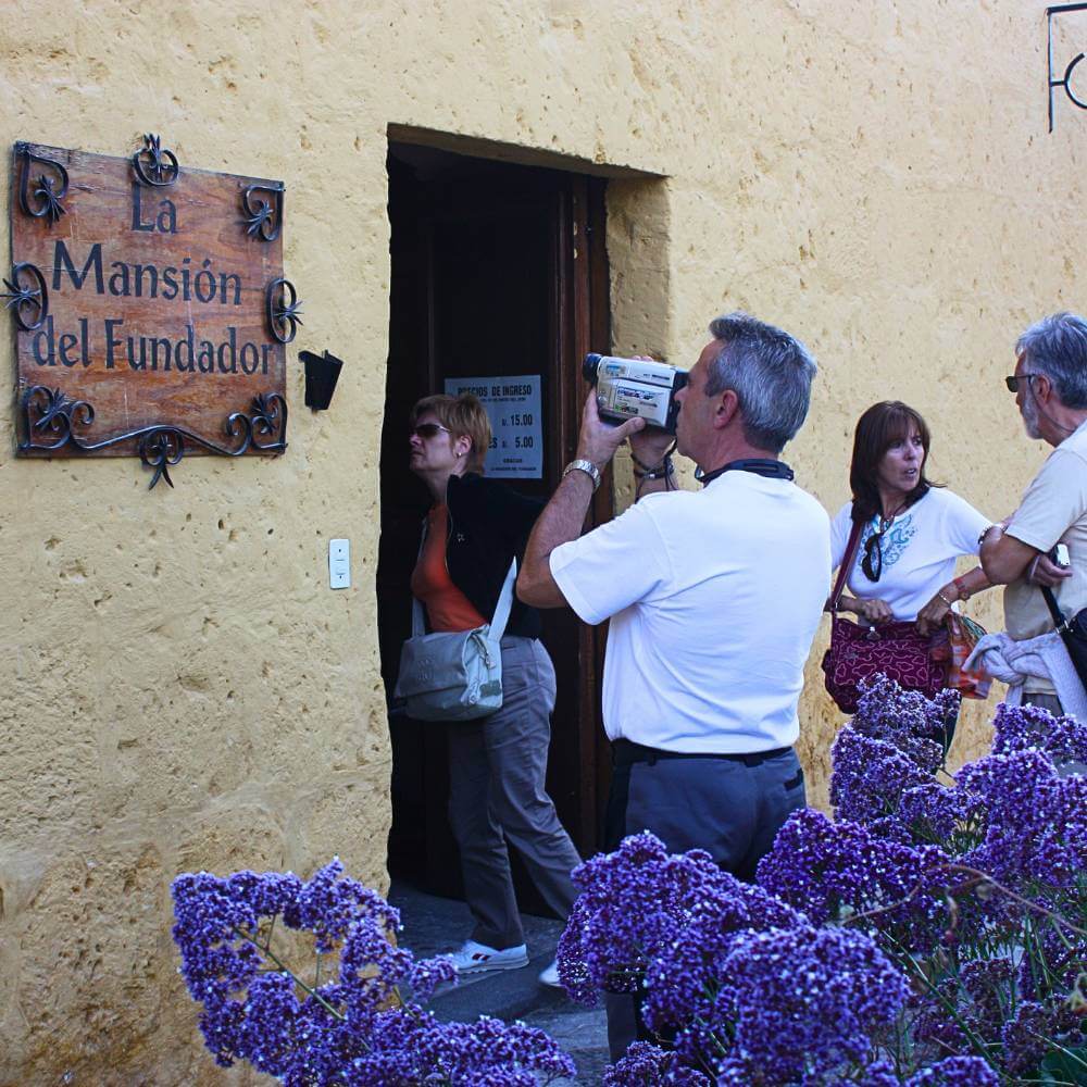 Visitors entering the historic Founder's Mansion during the Arequipa Countryside Tour, one of the city's finest colonial estates preserving Arequipa's rich heritage.