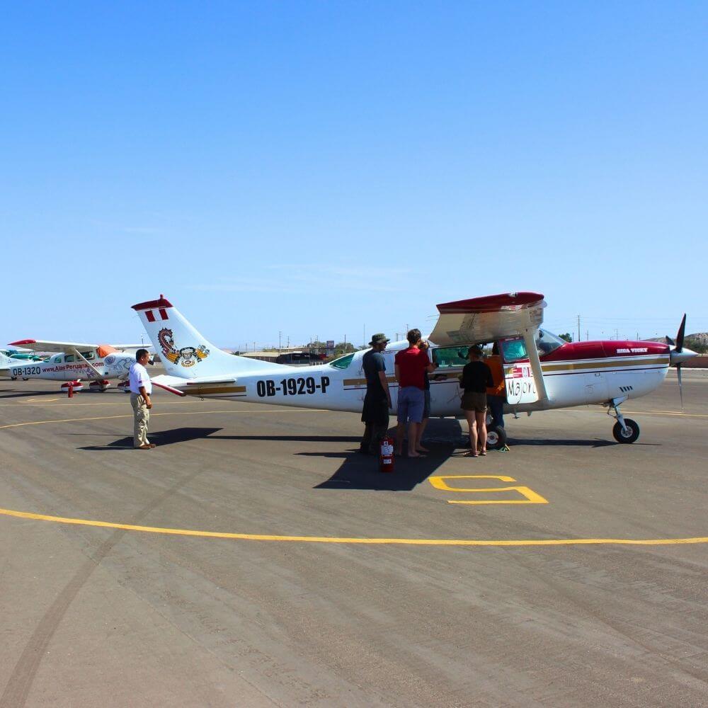 Passengers boarding a light aircraft before a Nazca Lines flight during the Nazca Lines Tour from Cusco in southern Peru.